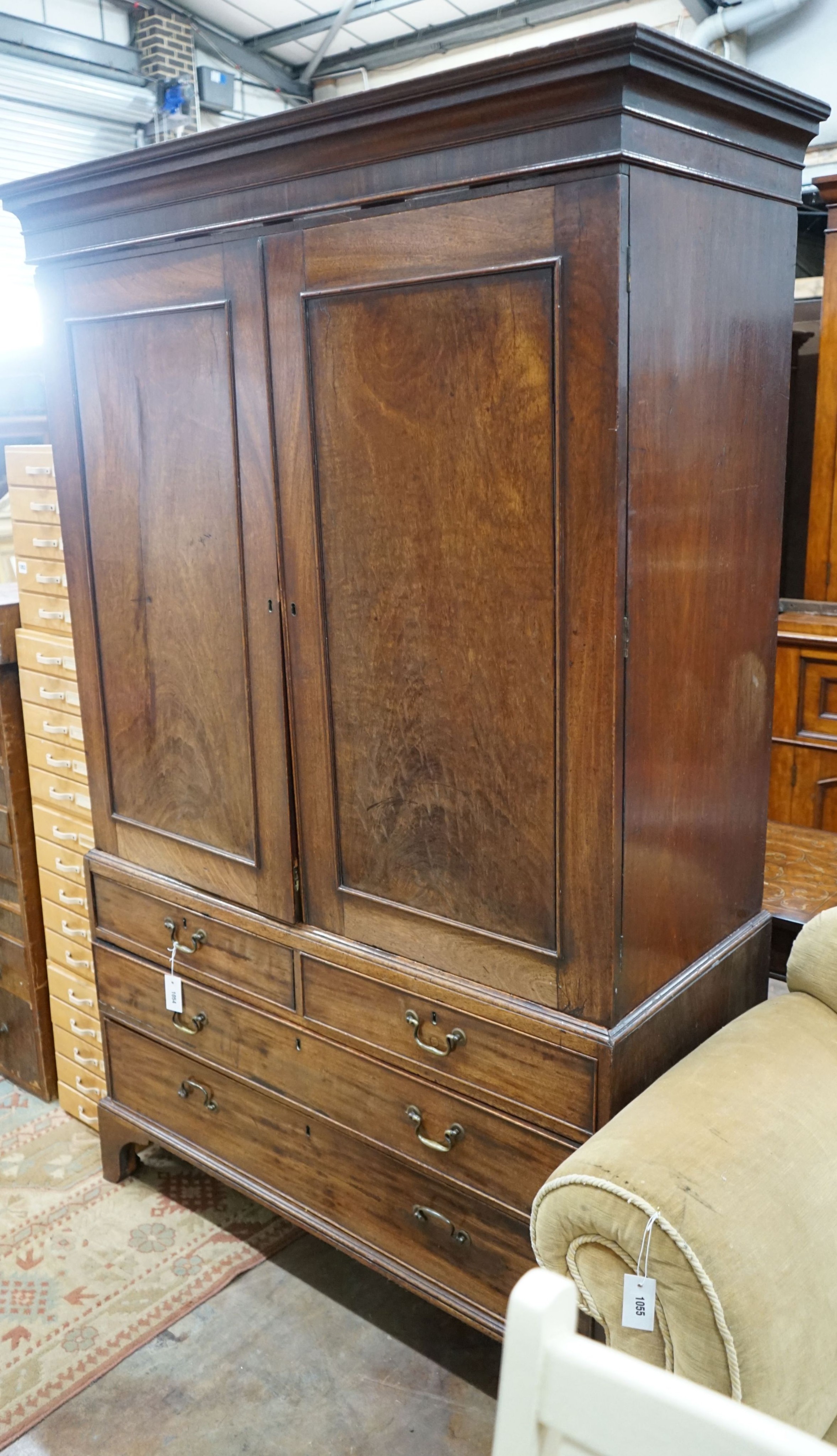 A George III mahogany linen press, width 126cm, depth 56cm, height 197cm